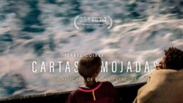 Documental Cartas Mojadas, 2020. Fotografia de persones refugiades mirant el mar, des d'una barc. Paula Palacios